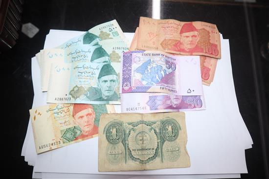 A collection of African and Egyptian currency, including Bank of Biafra banknotes,